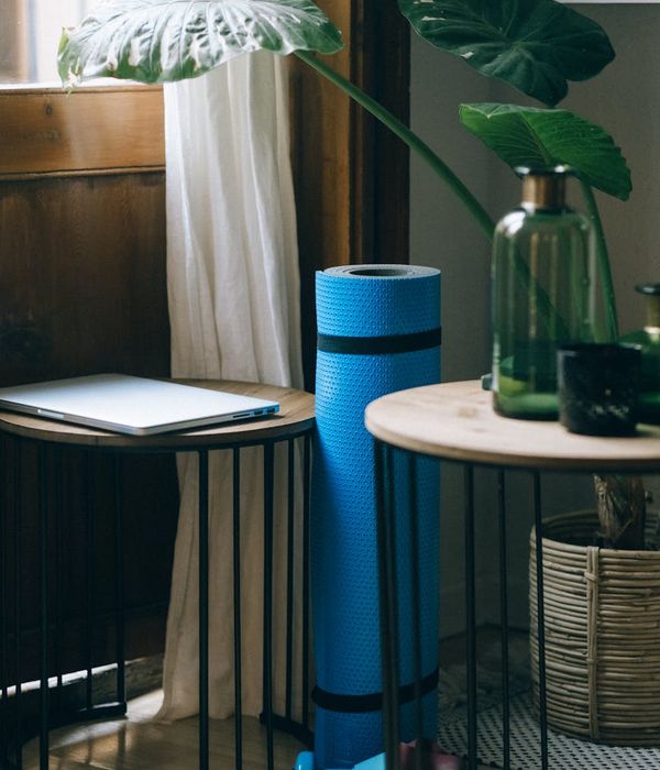 Woman performing a light cardio exercise in a bright, calming environment.